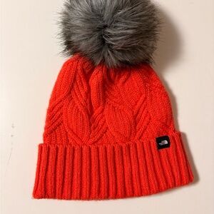 The North Face Orange Beanie with Fluffy Gray Pom